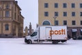 Delivery truck of the Posti group, the main Finnish postal service parked on the street in winter