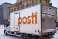 Delivery truck of the Posti group, the main Finnish postal service parked on the street in winter