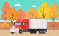 Delivery truck rides on road near autumn trees. Wagon with trailer for transporting goods worldwide Royalty Free Stock Photo