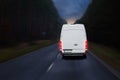 Delivery van on a country road Royalty Free Stock Photo