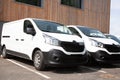 Delivery vans ready to leave to deliver the parcels, park in front of the head office of the company Royalty Free Stock Photo