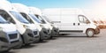 Delivery vans in a row with space for logo or text. Express delivery and shipment service concept