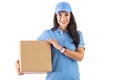 Delivery woman in blue cap and t-shirt unform holding blank cardboard box. Dark-haired smiling courier with the parcel. Isolated