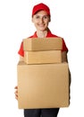 Delivery woman in red uniform holding cardboard packages in front. isolated on white background