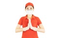 Delivery woman in red uniform Raise hands to welcome and service isolated on white background.Courier in protective mask and