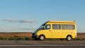 Delivery yellow minitruck Royalty Free Stock Photo