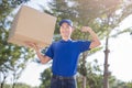 Deliveryman hold heavy box