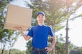 Deliveryman hold heavy box