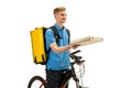 Deliveryman isolated on white studio background. Contacless delivery service during quarantine. Royalty Free Stock Photo