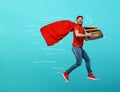 Deliveryman with pizzas acts like a powerful superhero. Concept of success and guarantee on shipment.