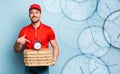 Deliveryman is punctual to deliver quickly pizzas. Cyan background