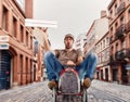 Deliveryman runs fast with a toy car to deliver pizza Royalty Free Stock Photo