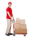 Deliveryman with a trolley of boxes Royalty Free Stock Photo