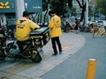 deliveryman waiting for service in the street of wuhan city hubei province china