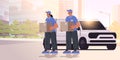deliverymen holding cardboard boxes near delivery van couriers carrying parcels express delivery service happy labor day