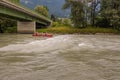 Family canoeing on a river