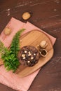 Dellicious homemade chocolate walnut muffin on table. Ready to e Royalty Free Stock Photo