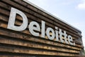 Deloitte professional service company network logo on the building