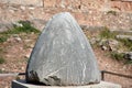 The omphalos stone, navel of the world, Delphi archaeological site along the slope of Mount Parnassus Royalty Free Stock Photo