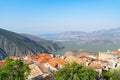 From Delphi, overlooking the towns roof-tops and down valley to part od Corinthian coast and little town Itea Royalty Free Stock Photo