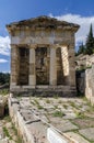 Delphi, Phocis / Greece. The `Treasure` of the Athenians was one of the most important and impressive buildings Royalty Free Stock Photo