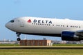 Delta Air Lines Airbus A330 passenger plane taking off from Amsterdam-Schiphol International Airport