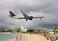 Airplane flying over Maho Beach, Sint Maarten, Dutch Caribbean