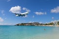 Airplane flying over Maho Beach, Sint Maarten, Dutch Caribbean