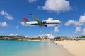 Airplane flying over Maho Beach, Sint Maarten, Dutch Caribbean