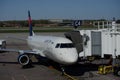 Minneapolis, MN - May 2 2018: A Delta Air Lines Delta Connection jet airplane waits at a gate at MSP International Airport for Royalty Free Stock Photo