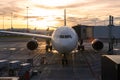 Delta Airbus A330 300 at a Gate at Amsterdam Schiphol Airport during a Sunrise