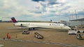 Delta Airlines MD-90 last flight pushed back from the boarding gate on departure Royalty Free Stock Photo