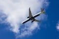 An Delta airlines plane flying in the sky with blue sky and clouds in Inglewood California