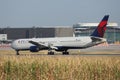 Delta Airlines plane taxiing on taxiway Royalty Free Stock Photo