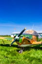 Delta, BC - May 7, 2019: Single engine propeller plane with camoflage style paint stored at Delta Heritage Airpark.