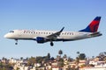 Delta Connection Embraer ERJ 175 airplane San Diego airport Royalty Free Stock Photo