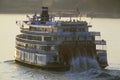 The Delta Queen, a relic of the steamboat era of the 19th century, still rolls down the Mississippi River Royalty Free Stock Photo