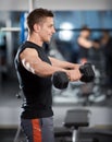 Delts workout with dumbbells Royalty Free Stock Photo