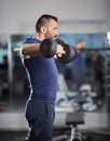 Delts workout with dumbbells Royalty Free Stock Photo