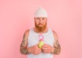 Delusion man with beard and tattoos acts like a small newborn Royalty Free Stock Photo