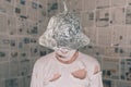 Delusional paranoid man with tin foil hat talking Royalty Free Stock Photo