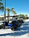 Deluxe Golf Cart in Community Parking Space Royalty Free Stock Photo