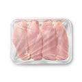a image of a white chicken breast plastic tray isolated on a white background Royalty Free Stock Photo