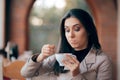 Funny Squeamish Girl with Hot Chocolate Drink Royalty Free Stock Photo