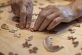 Dementia prevention. Elderly man hands doing jigsaw puzzle at home Royalty Free Stock Photo