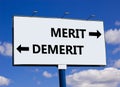 Demerit or merit symbol. Concept word Demerit or Merit on beautiful billboard with two arrows. Beautiful blue sky with clouds