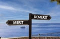Demerit or merit symbol. Concept word Demerit or Merit on beautiful signpost with two arrows. Beautiful blue sea sky with clouds