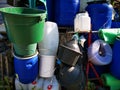 Demijohns, blue barrels and plastic products Royalty Free Stock Photo