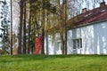 Demino / Rybinsk, Russia - October 3, 2020: Vacation home in the forest among the pine trees. Country villa for outdoor recreation