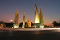 Democracy monument is circular traffic landmark at Bangkok Thailand . architecture in history . slow motion of light on street at